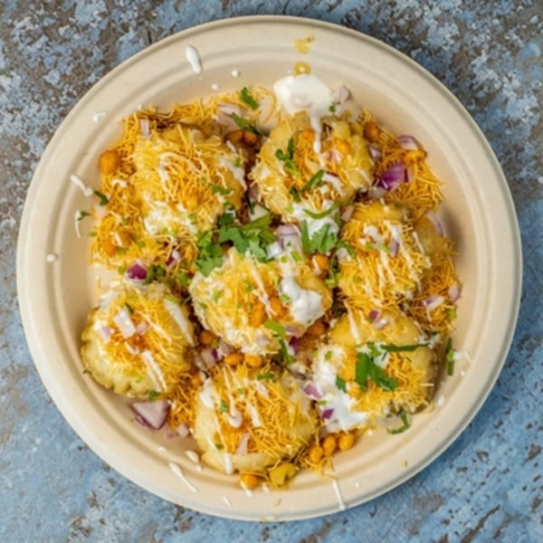 Hello! India's Papri Chaat, a savory Indian snack with crispy wafers, potatoes, chickpeas, yogurt, and spices.